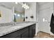Double vanity bathroom with granite countertop and shower at 4072 N Rome St, Aurora, CO 80019