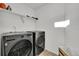 Laundry room with LG washer and dryer, and shelving at 4072 N Rome St, Aurora, CO 80019