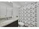 Clean bathroom with granite vanity and shower/tub combo at 4072 N Rome St, Aurora, CO 80019