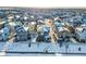 Aerial view of houses with snow covered rooftops at 4072 N Rome St, Aurora, CO 80019