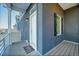 Front porch with white door and modern railing at 4072 N Rome St, Aurora, CO 80019
