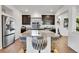 Modern kitchen with stainless steel appliances and granite countertops at 4072 N Rome St, Aurora, CO 80019