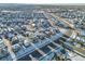 Aerial view of neighborhood with houses and snowy landscape at 4072 N Rome St, Aurora, CO 80019