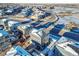 Aerial view of neighborhood with houses and snowy landscape at 4072 N Rome St, Aurora, CO 80019