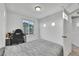 Bedroom with a gaming setup and large window at 4072 N Rome St, Aurora, CO 80019