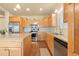 Modern kitchen featuring stainless steel appliances and light wood cabinetry at 6280 Indian Paintbrush St, Frederick, CO 80530