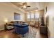 Living room with sectional sofa and accent chair at 6280 Indian Paintbrush St, Frederick, CO 80530