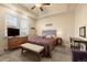Spacious main bedroom with a comfortable bed and dresser at 6280 Indian Paintbrush St, Frederick, CO 80530