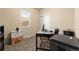 Home office space with a desk, chair, and built-in shelving at 6280 Indian Paintbrush St, Frederick, CO 80530