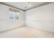 Simple bedroom with carpet and window at 17935 E Bethany Dr, Aurora, CO 80013