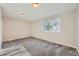 Bright bedroom with grey carpet and neutral walls at 17826 E Ada Dr, Aurora, CO 80017