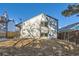 Side view of the house showcasing its siding and landscaping at 17826 E Ada Dr, Aurora, CO 80017