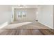 Spacious living room with hardwood floors and ceiling fan at 2985 Oxley St, Strasburg, CO 80136