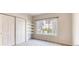 Bright bedroom with double door closet and built-in shelves at 10165 E Carolina Pl # 102, Aurora, CO 80247