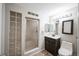 Basement bathroom with shower and glass block feature at 11713 Elm Ct, Thornton, CO 80233