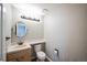 Small bathroom with single sink vanity and toilet at 11713 Elm Ct, Thornton, CO 80233