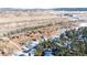 Community overview, showcasing houses nestled in a wooded area at 4285 Mohawk Dr, Larkspur, CO 80118