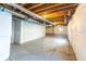 Unfinished basement with plumbing and electrical access at 4285 Mohawk Dr, Larkspur, CO 80118