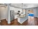 Modern kitchen featuring granite countertops and stainless steel appliances at 4285 Mohawk Dr, Larkspur, CO 80118