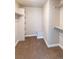 Spacious walk-in closet with ample shelving and hanging space at 4285 Mohawk Dr, Larkspur, CO 80118