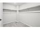 Large walk-in closet with double hanging rods at 6192 N Lisbon St, Aurora, CO 80019