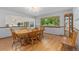 Dining room with a wooden table, chairs, and built-in hutch at 10101 W 72Nd Ave, Arvada, CO 80005