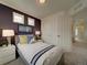 Cozy bedroom with a unique accent wall and built-in closet at , Commerce City, CO 80022