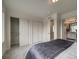 Bright bedroom with ample closet space and plush carpeting at , Commerce City, CO 80022