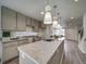 Modern kitchen with granite countertops and pendant lighting at , Commerce City, CO 80022