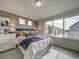 Spacious main bedroom with large window and plush bedding at , Commerce City, CO 80022