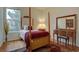 Small bedroom with a twin bed and hardwood floors at 11442 Ames Ct, Broomfield, CO 80020