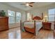 Spacious bedroom with wood floors and large windows at 11442 Ames Ct, Broomfield, CO 80020