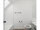 Clean bathroom with white tile and gray vanity at 8701 Huron St # 10-210, Thornton, CO 80260