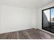 Bedroom with sliding door to private balcony at 8701 Huron St # 10-210, Thornton, CO 80260