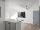 Bright kitchen features granite countertops and modern gray cabinets at 8701 Huron St # 10-210, Thornton, CO 80260