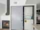 Stackable washer and dryer in a compact laundry closet at 8701 Huron St # 10-210, Thornton, CO 80260