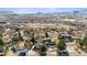 An aerial view of the home and the surrounding neighborhood on a clear winter day at 16730 Golden Hills Rd, Golden, CO 80401