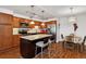 Modern kitchen with stainless steel appliances and island at 725 S Alton Way # 3B, Denver, CO 80247