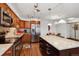 Modern kitchen with stainless steel appliances and island at 725 S Alton Way # 3B, Denver, CO 80247