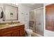 Bathroom with granite countertop and walk-in shower at 725 S Alton Way # 3B, Denver, CO 80247