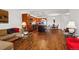 Open concept kitchen with wood cabinets and island at 725 S Alton Way # 3B, Denver, CO 80247