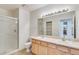 Clean bathroom with double vanity and a shower at 7931 W 55Th Ave # 112, Arvada, CO 80002