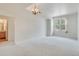 Spacious bedroom with large windows and neutral decor at 7931 W 55Th Ave # 112, Arvada, CO 80002