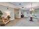 Bright and spacious condo lobby with comfortable seating area at 7931 W 55Th Ave # 112, Arvada, CO 80002