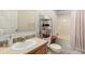 Bathroom with tub, toilet and vanity at 6105 Needlegrass # 307, Frederick, CO 80530