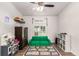 Playroom with green couch and play area at 6105 Needlegrass # 307, Frederick, CO 80530