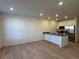 Modern kitchen with stainless steel appliances and an island at 14585 W 91St Ave # D, Arvada, CO 80005