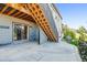 Covered patio and stairs leading to the backyard at 7095 S Titus St, Aurora, CO 80016