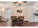 Cozy dining area with wood table and chairs adjacent to the kitchen at 445 Wright St # 111, Lakewood, CO 80228