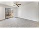 Bright bedroom with sliding glass door to patio at 16812 E Mansfield Cir, Aurora, CO 80013